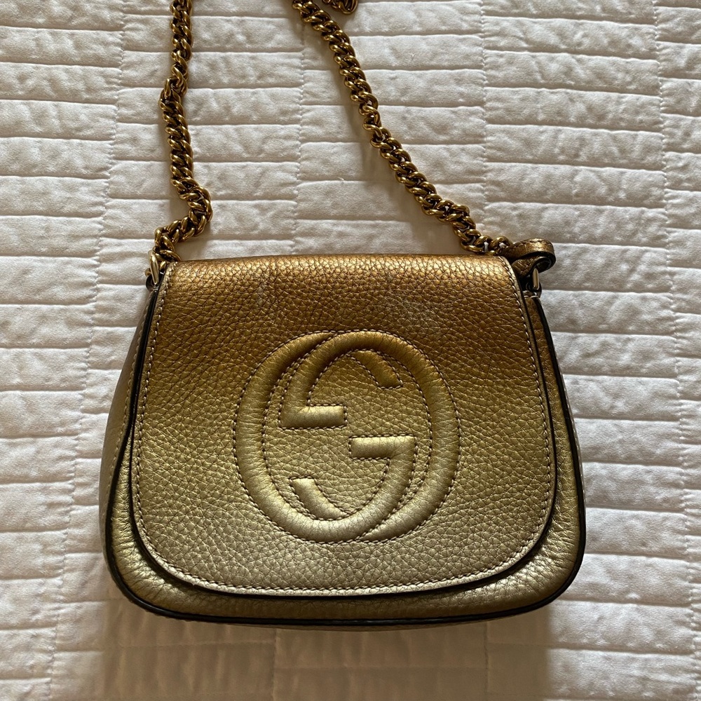Gucci metallic leather bag